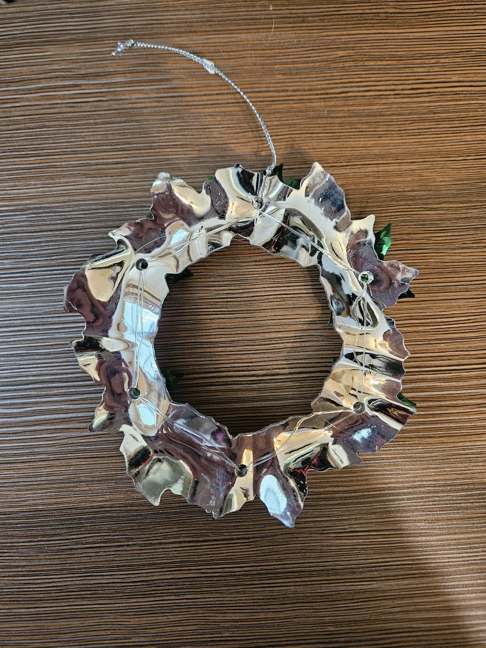 Crystal-Look Holiday Wreath Ornament with Red Bells and Green Leaves